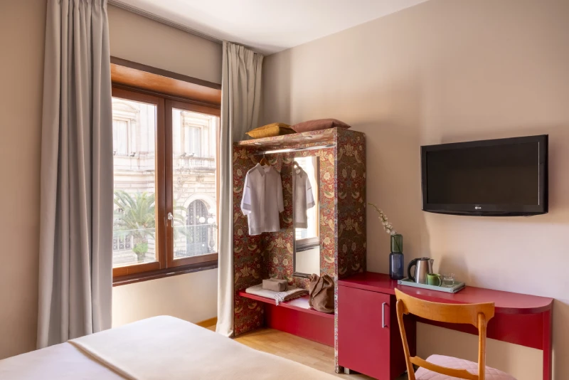 Triple room with desk, TV and open wardrobe, modern design with urban view in Monti district Rome - Monti First, BZAR hotels in Rome